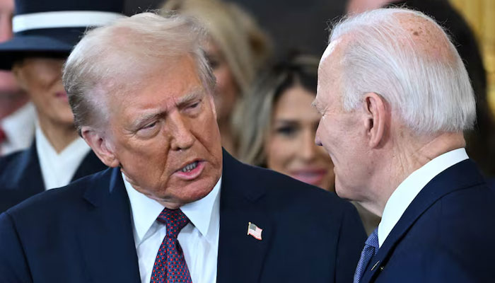 Former president Joe Biden looks on as US President Donald Trump arrives during the inauguration ceremony before Trump is sworn in as the 47th US President in the US Capitol Rotunda in Washington, DC, on January 20, 2025. — Reuters