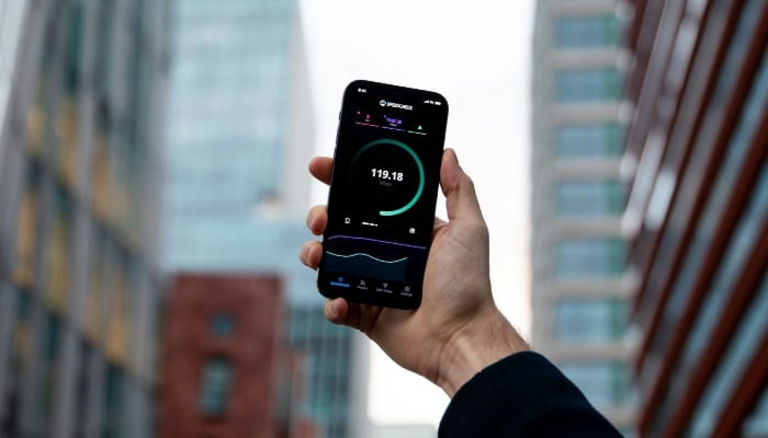 This representational image shows an individual checking their mobile network. — Unsplash