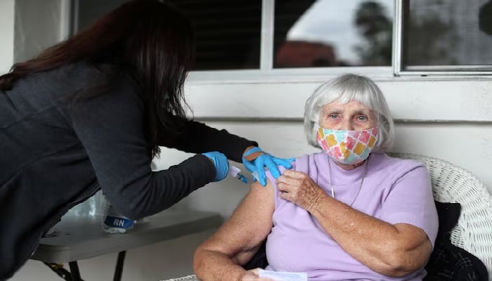 Sister Barbara Sullivan, 84, receives a coronavirus disease vaccine at a vaccination drive for retired nuns at the Sisters of St. Joseph of Carondelet independent living centre in Los Angeles, California, US, March 3, 2021. — Reuters