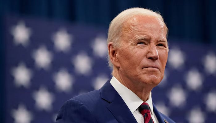 Former US president Joe Biden looks on during his visit at the Chavis Community Center in Raleigh, North Carolina, US, March 26, 2024. — Reuters