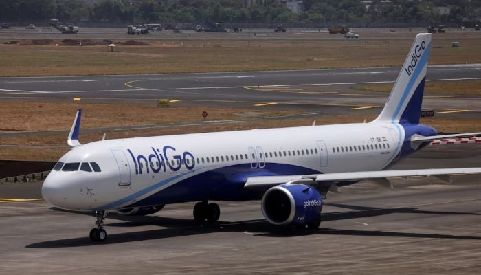 An IndiGo airlines passenger aircraft taxis on the tarmac at Chhatrapati Shivaji International airport in Mumbai, India, May 29, 2023. — Reuters