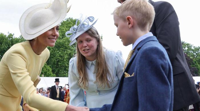 Kate Middleton gets emotional as she meets 'lovely family' at Buckingham Palace