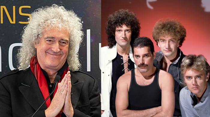 Brian May with his guitar