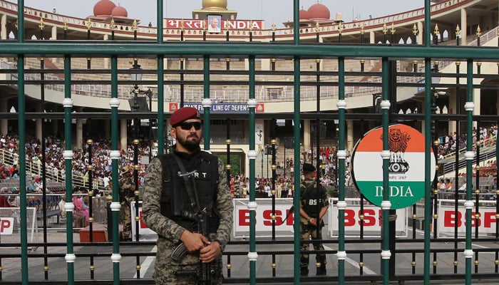 A Pakistan Ranger stands guard before the start of a parade at the Pakistan-India joint check post at Wagah border, near Lahore, on May 4, 2025. — Reuters