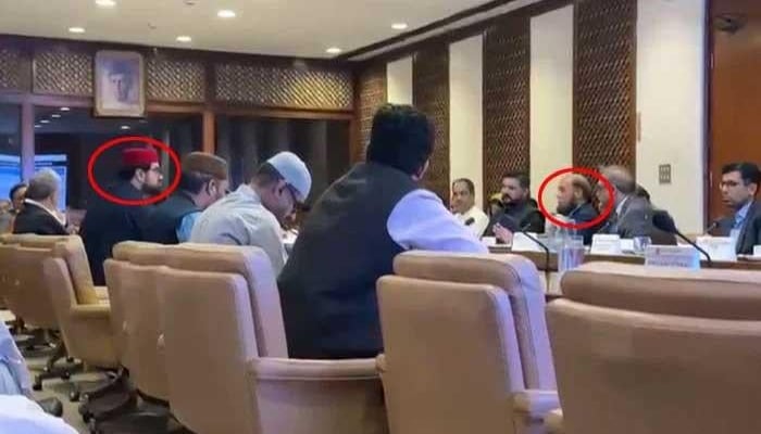 Senator Aimal Wali Khan (left red circle) and PTA Chairman Major General (retd) Hafeez Ur Rehman (right red circle) during the Senate Privileges Committee, on May 21, 2025. — X