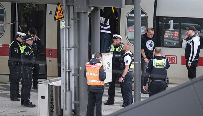 Police officers gather at Hamburgs main train station, after several people were injured in a knife attack, in Hamburg, Germany, May 23, 2025. — Reuters