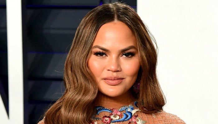 Chrissy Teigen leaves fans worried with bandaged face