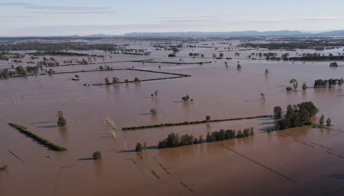 A drone view shows a flooded area near the Hunter River in Heatherbrae, Australia, on May 24, 2025. —Reuters
