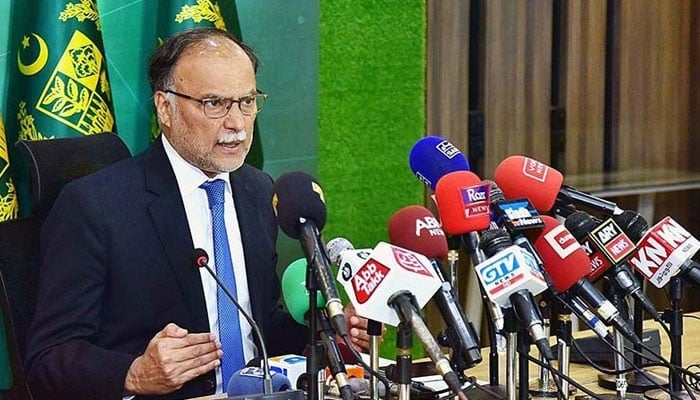Federal Minister for Planning, Development and Special Initiative Ahsan Iqbal addressing a press conference. — APP/File