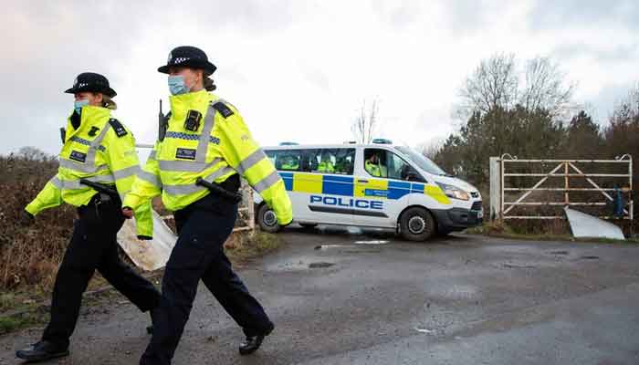 Police are seen at the Great Chart Golf & Leisure Country Club, Britain. — Reuters/File