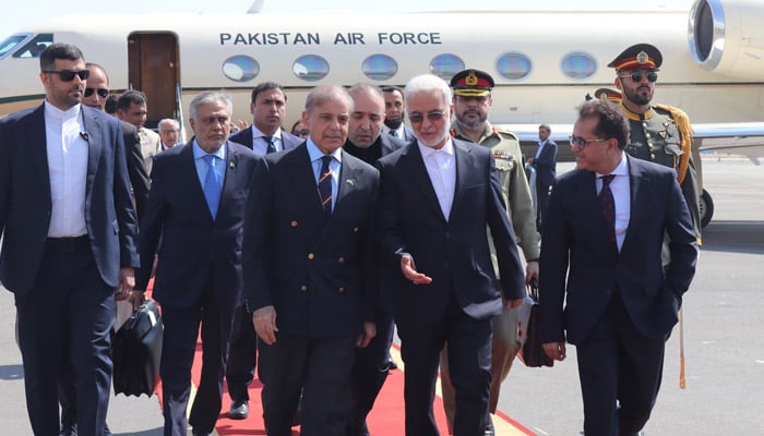 Irans Interior Minister Eskandar Momeni receives Prime Minister Shehbaz Sharif at Mehrabad Airport, Tehran, Iran, May 26, 2025. — X/@GovtofPakistan