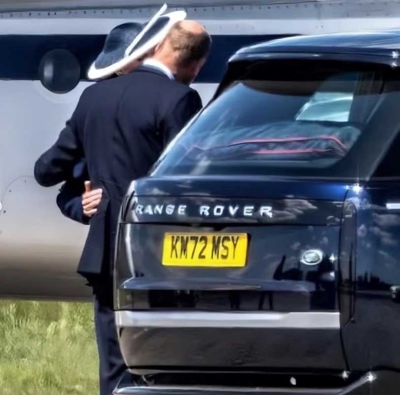 Prince William hugs wife Kate Middleton in airport photo