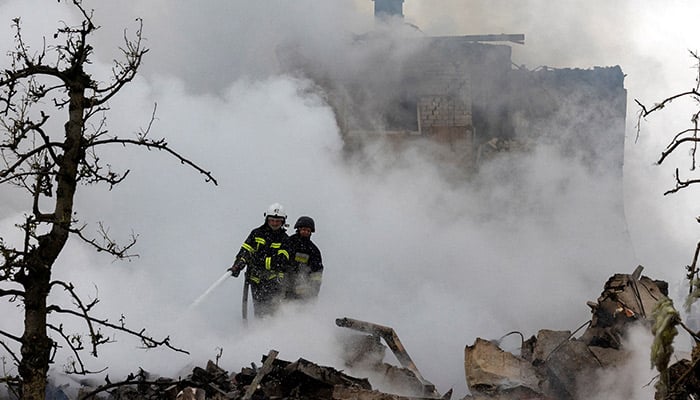 Emergency workers extinguish fire in the debris of a private house that was destroyed in a Russian rocket strike, amid Russias attack on Ukraine, in Markhalivka, Kyiv region, Ukraine, May 25, 2025. — Reuters
