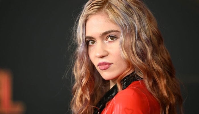 Grimes shares disappointed news with fans