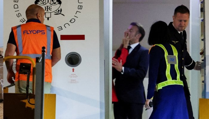 Frances President Emmanuel Macron was pushed in the face by his wife Brigitte Macron as the couple arrived in Vietnam to begin a tour of Southeast Asia, at Noi Bai International Airport, in Hanoi, Vietnam, May 25, 2025. — Reuters
