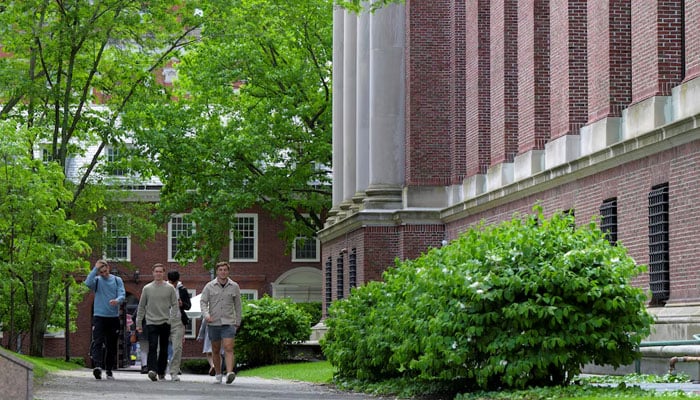 Students walk on the campus of Harvard University in Cambridge, Massachusetts, US, May 23, 2025. —Reuters