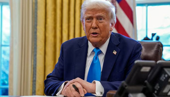 US President Donald Trump speaks as he signs documents in the Oval Office at the White House in Washington, U.S. February 4, 2025. — Reuters