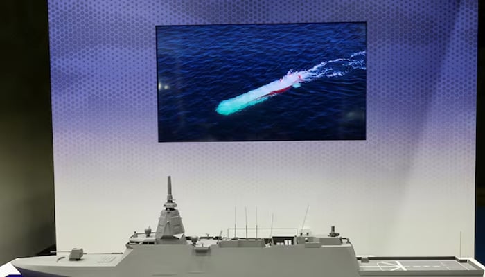 A mock model of the FFM Upgraded Mogami class is displayed during the Defence Security Equipment International (DSEI) Japan at Makuhari Messe in Chiba, east of Tokyo, Japan May 21, 2025. — Reuters