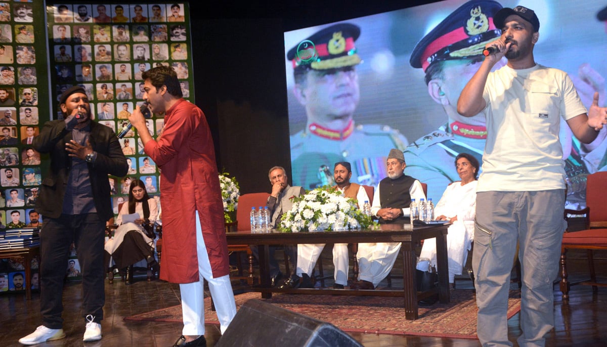 Artists Ali Abbas Nadeem Abbas and Zuhaib Hannas perform at 12 Anniversary of the valiant son of the soil Capt Salman Shaheed to pay tribute to Shuhada end Ghazis at Alhamra Hall, Lahore. — APP