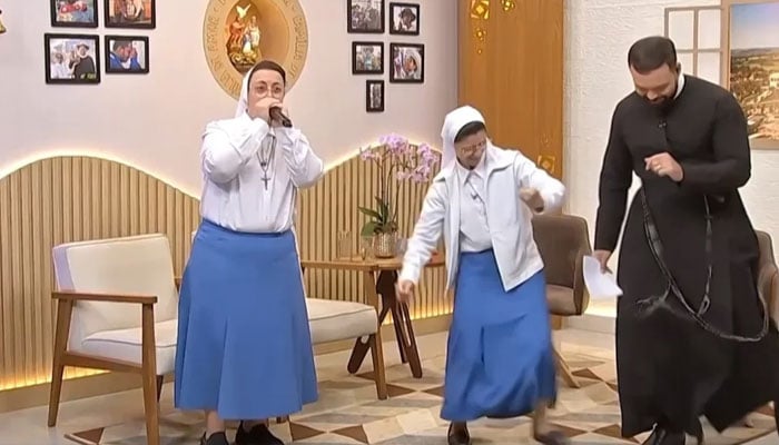 Sisters Marizele Cassiano and Marisa de Paula appear on the Catholic TV network Eternal Father. —TV PAI ETERNO/File