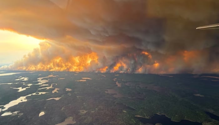Smoke rises from wildfire WE024 which has prompted a pre-evacuation notice in Flin Flon, Manitoba, Canada May 27, 2025. — Reuters
