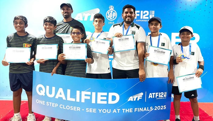 Sri lankan players (left) and Pakistani players (right) pose with their certificate after winning ATF 12 championship in Colombo, May 30, 2025 — Reporter