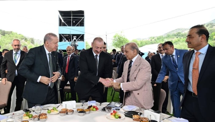 Prime Minister Muhammad Shehbaz Sharif attending the Independence Day ceremony in Azerbaijan, along with presidents of Azerbaijan and Türkiye and Field Marshal Syed Asim Munir. — Facebook/@GovtofPakistan