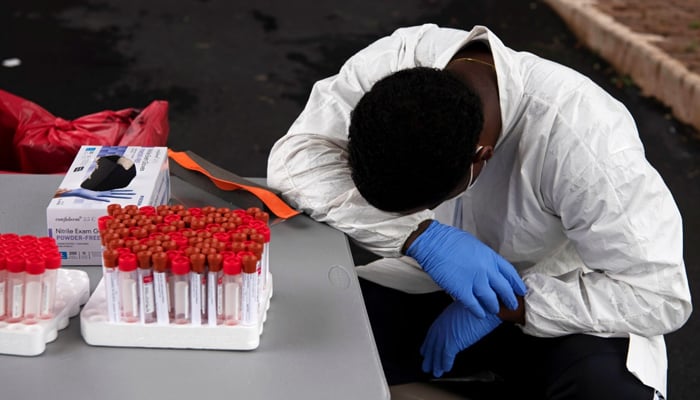 File photo of a healthcare worker awaiting for coronavirus testing in Houston, Texas. — Reuters
