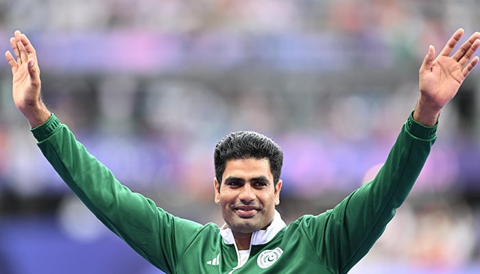 Gold medalist Arshad Nadeem of Team Pakistan celebrates on the podium during the Mens 110m Hurdles ceremony on day fourteen of the Olympic Games Paris 2024 at Stade de France on August 09, 2024 in Paris, France. — Reuters