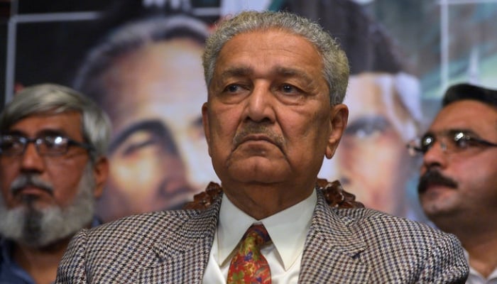 Abdul Qadeer Khan sits during a public meeting in Islamabad on February 26, 2013. — AFP