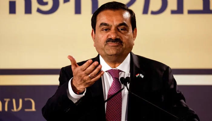 Indian billionaire Adani under new scrutiny from US prosecutors: WSJ 1 Indian billionaire Gautam Adani speaks during an inauguration ceremony after the Adani Group completed the purchase of Haifa Port earlier in January 2023, in Haifa port, Israel January 31, 2023. — Reuters