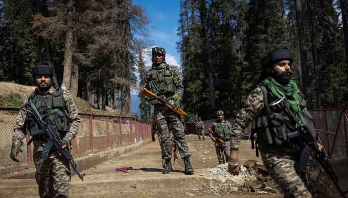 Indian security force personnel stand guard at the site of a suspected militant attack on tourists in Baisaran near Pahalgam in south Kashmirs Anantnag district, April 24, 2025. — Reuters