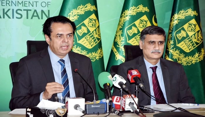 Minister of State for Interior Talal Chaudhry (left) addresses a press conference in Islamabad on June 3, 2027. — PID