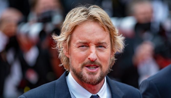 Owen Wilson laughs off the strange job his son dreams of