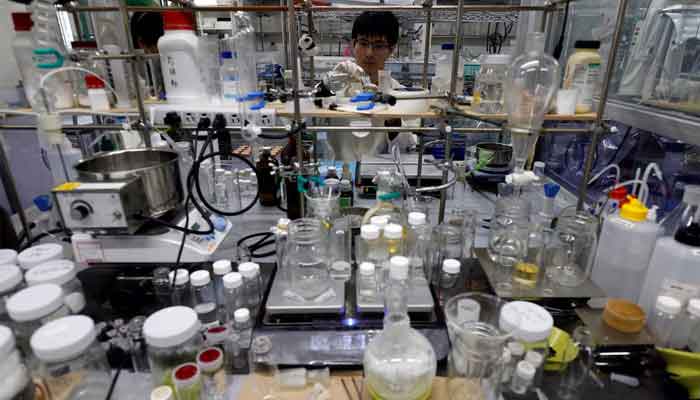 A researcher demonstrates the process of compounding the ocean-degradable plastic raw materials at the Centre for Emergent Matter Science (CEMS) of Japanese research institution Riken in Wako, Saitama Prefecture, Japan May 27, 2025. — Reuters