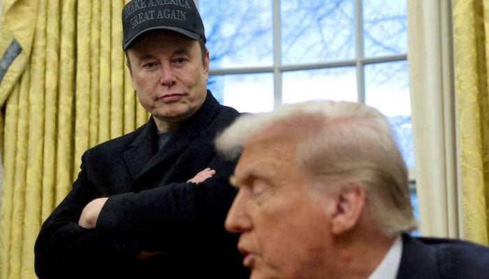 Elon Musk listens to US President Donald Trump speak in the Oval Office of the White House in Washington, DC, US, February 11, 2025. — Reuters