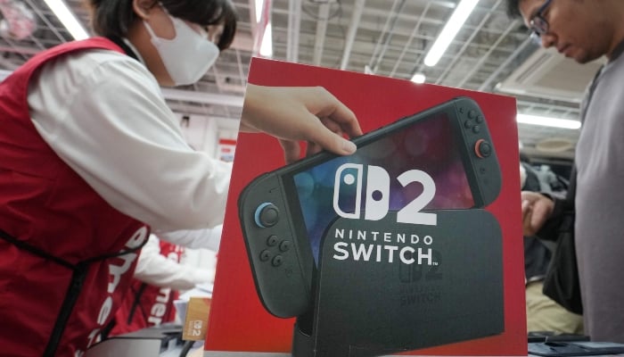A customers purchases Nintendo Switch 2 at an electronics retailer in Tokyo, Japan, on June 5, 2025. — AFP