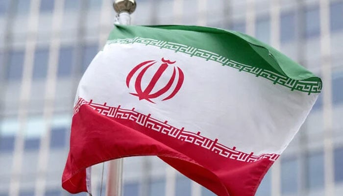 The Iranian flag outside the IAEA headquarters during the International Atomic Energy Agencys Board of Governors meeting at the agencys headquarters in Vienna, Austria, on November 20, 2024. —  AFP