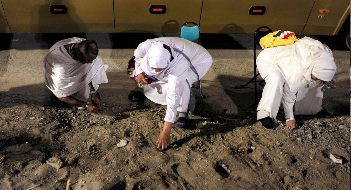 Muslim pilgrims perform the symbolic stoning of the devil ritual as part of the Hajj pilgrimage in Mina on June 6, 2025 — AFP