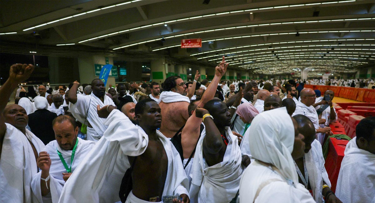 Muslim pilgrims perform the symbolic stoning of the devil ritual as part of the Hajj pilgrimage in Mina on June 6, 2025 — AFP