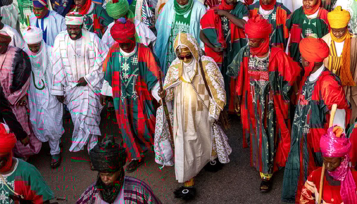 Muhammadu Sanusi II, Emir of Kano State, walks to attend the Eid ul Adha prayer in Kano, Nigeria, on June 6, 2025. Reuters