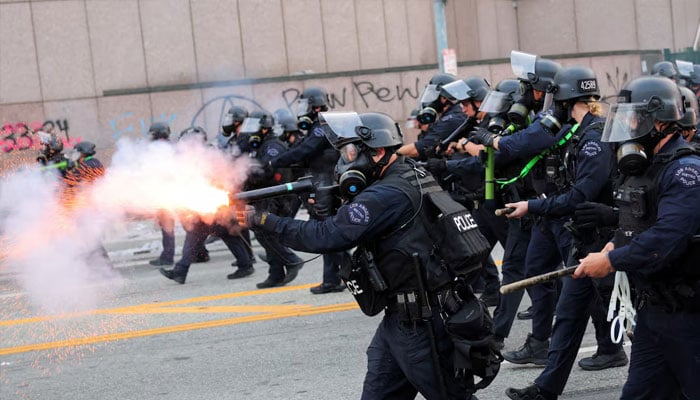A police officer uses stun grenades as they approach the protesters gathered around the Los Angeles Federal Building following multiple detentions by Immigration and Customs Enforcement (ICE), in downtown Los Angeles, California, US, June 6, 2025. — Reuters