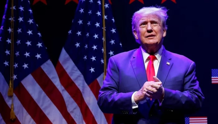 US President Donald Trump takes the stage in Davenport, Iowa, US, on March 13, 2023. — Reuters