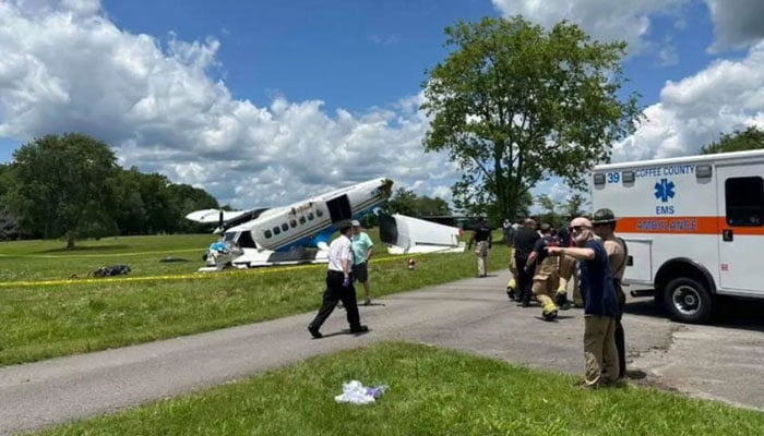 The image shows a plane lying in wreckage in Tennessee. — X@@IntelPointAlert/File