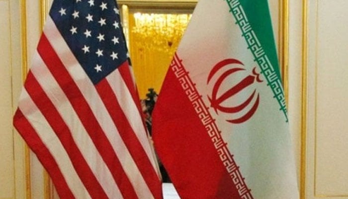 US and Iran flags — AFP