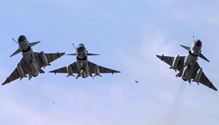 Pakistan Air Force J10-C fighter jets fly over Islamabad during a national day parade on March 23, 2025. — AFP