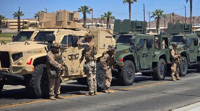 White House escalates immigration fight with bold military move