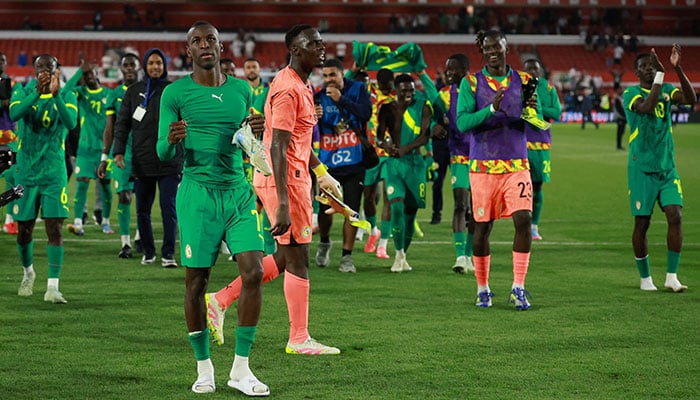 Football Football - International friendly - The City Ground, Nottingham, Britain - SENEGALS EDOURD MENDY and Nicolas Jackson celebrate after the match on June 10, 2025. - Reuters