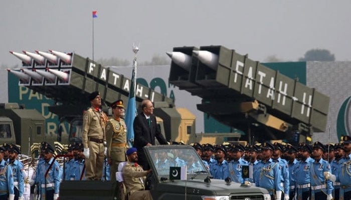 President Asif Ali Zardari inspects a guard of honour during Pakistan Day Parade in Islamabad on March 23, 2024. — AFP