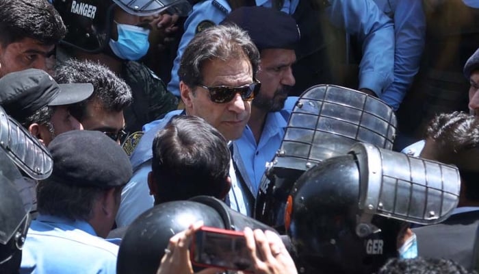 PTI founder Imran Khan arrives to appear at the Islamabad High Court on May 12, 2023. — APP